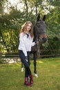 Girl teenager with a horse Royalty Free Stock Photo