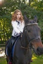 Girl teenager with a horse Royalty Free Stock Photo