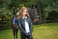 Girl teenager with a horse Royalty Free Stock Photo