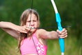 Girl teenager with bow nock and aims Royalty Free Stock Photo