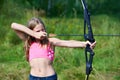 Girl teenager with bow nock and aims Royalty Free Stock Photo