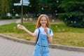 Girl teenager happy smiling blows soap bubbles Royalty Free Stock Photo