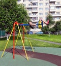 The girl the teenager is shaken on a swing.