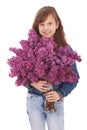 Girl teenager standing with lilac in hands Royalty Free Stock Photo