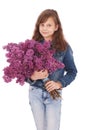 Girl teenager standing with lilac in hands Royalty Free Stock Photo