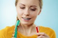 Girl with teeth braces using interdental and traditional brush