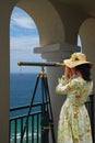 Girl with Telescope under Arches Royalty Free Stock Photo