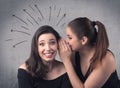 Girl telling secret things to her girlfriend Royalty Free Stock Photo