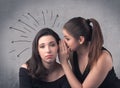 Girl telling secret things to her girlfriend Royalty Free Stock Photo