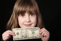 Girl with ten dollars Royalty Free Stock Photo