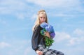 Girl tender fashion model hold hydrangea flowers bouquet. Makeup and fashion style. Fashion trend spring. Fashion and