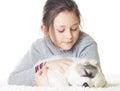 Girl tenderly embraces a puppy Royalty Free Stock Photo