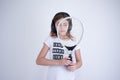 Girl with tennis racket looking right Royalty Free Stock Photo