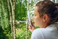 Girl thinks about book read. Young beauty girl with book in hand