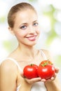 Girl with three red tomatoes Royalty Free Stock Photo