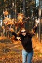 Girl throwing leaves Royalty Free Stock Photo