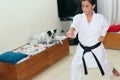 A girl throwing a punch during karate training