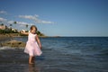 Girl Throwing stones Royalty Free Stock Photo