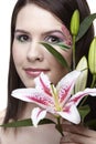 Girl with tiger lily Royalty Free Stock Photo