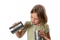 Girl with Tin Can / String Phone - Expressing Skepticism Royalty Free Stock Photo