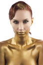 The girl tinted in gold, isolated on a white background