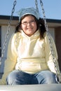 Girl On Tire Swing Royalty Free Stock Photo