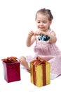 Girl about to open her Christmas presents Royalty Free Stock Photo