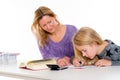 Girl and together with teacher in the classroom Royalty Free Stock Photo