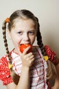 Girl with tomato Royalty Free Stock Photo