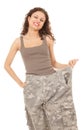 Girl in too great camouflage trousers Royalty Free Stock Photo