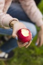 The girl took a bite of a juicy tasty red Apple Royalty Free Stock Photo