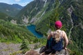 Girl on Top of Cliff with Beautiful View of Canadian Mountain Landscape