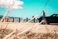 Girl on top of Convertible at Half Moon Bay, California Royalty Free Stock Photo