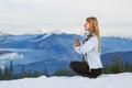 Girl on top of a mountain doing yoga Royalty Free Stock Photo