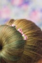 Girl with topknot on nape