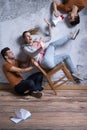 Girl on toppling chair Royalty Free Stock Photo