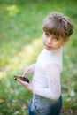 Girl with a touchscreen phone Royalty Free Stock Photo