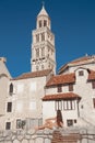 Girl tourist enjoying and sightseeing Marble ancient roman architecture in city center of town Split, view cathedral Saint