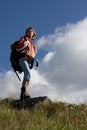 Girl tourist exploring the mountains. Royalty Free Stock Photo