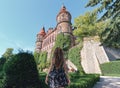 A girl tourist near Zamek Ksiaz in Walbrzych.