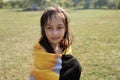 Girl towel in river lying relaxed after swimming bath nature. Girl in a towel Royalty Free Stock Photo