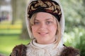 Girl in traditional costume in Keukenhof, Lisse, the Netherlands