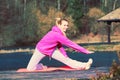 Girl train outside in park. Royalty Free Stock Photo