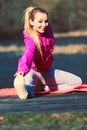 Girl train outside in park. Royalty Free Stock Photo