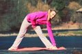 Girl train outside in park. Royalty Free Stock Photo