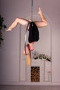 Girl training on aerial ring Royalty Free Stock Photo