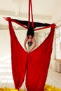 Girl training on aerial silks