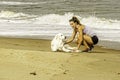 Girl Training Dog at Virginia Beach Ocean Front