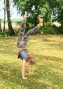 Girl training handstand Royalty Free Stock Photo