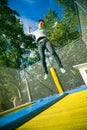 Girl on trampoline Royalty Free Stock Photo